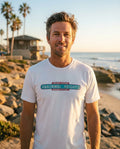Person wearing Abnormal Heights T-Shirt in white at Windansea Beach in San Diego