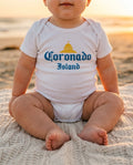Baby wearing Coronado Island bodysuit at Coronado Beach in San Diego