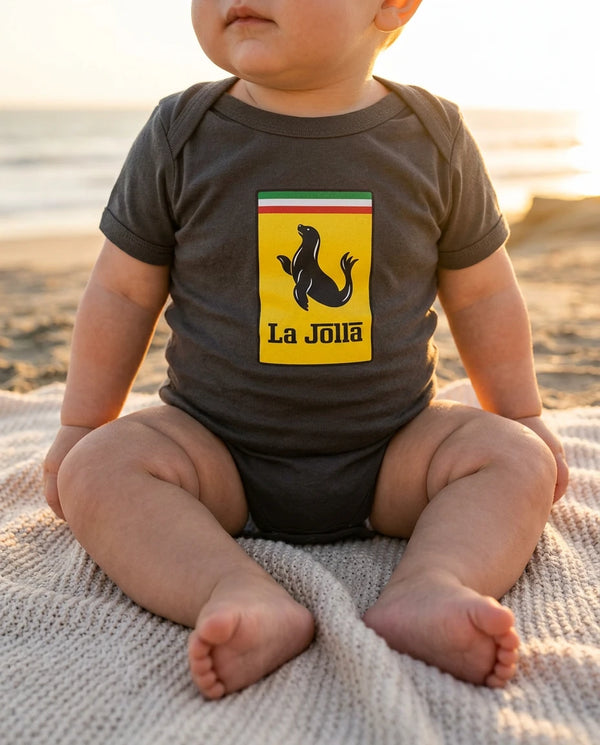Baby wearing La Jolla (Ferrari Parody) bodysuit at La Jolla Cove in San Diego