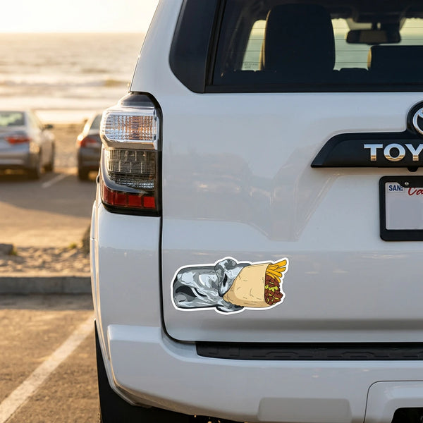 California Burrito bumper sticker on the rear of a car at a San Diego beach