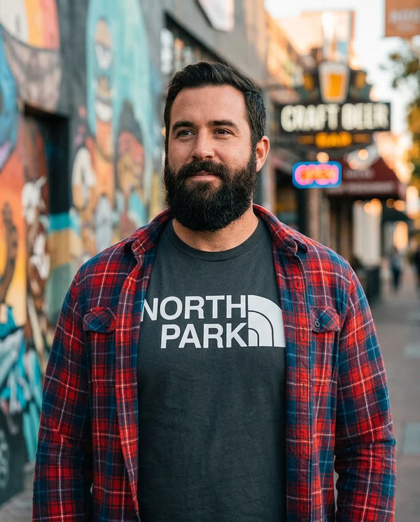 Person wearing North Park (North Face Parody) T-Shirt in North Park San Diego