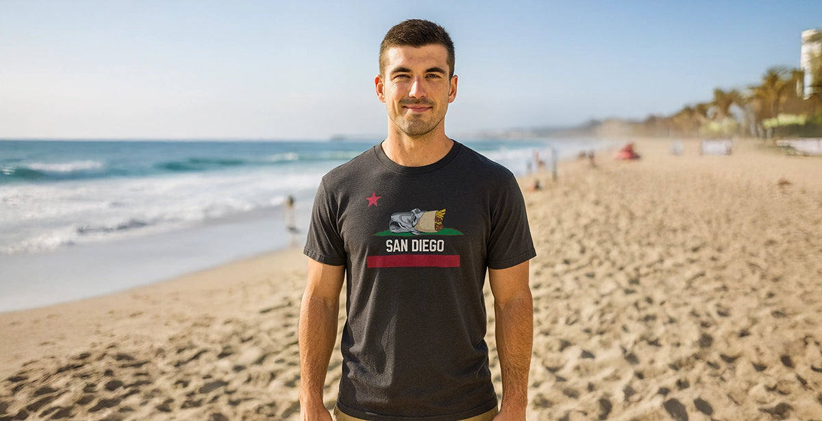 Guy on beach wearing San Diego burrito flag t-shirt from SanDiegoHumor